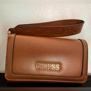 Guess wrist wallet. Never used.
